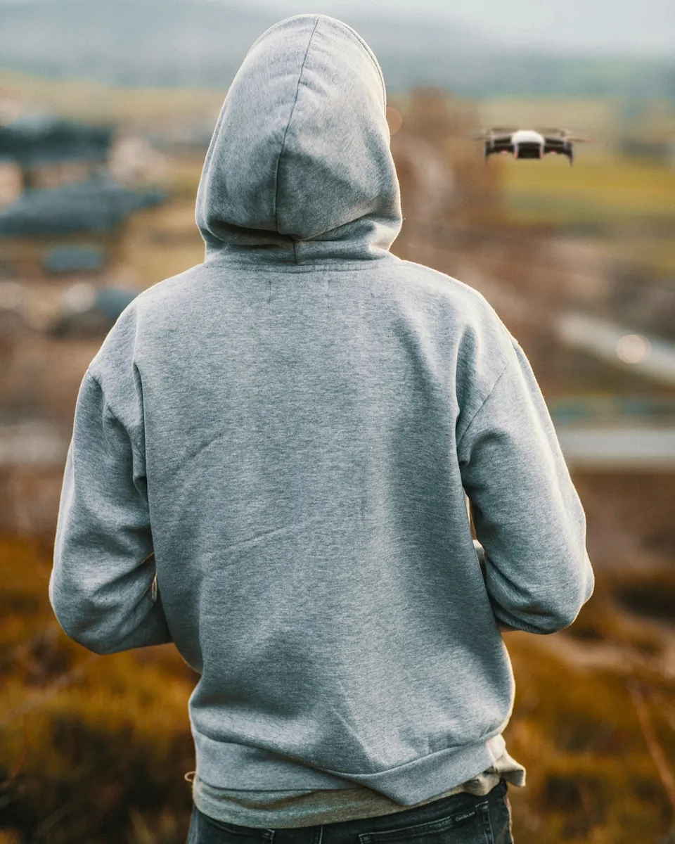 Grey pullover hoodie, back view